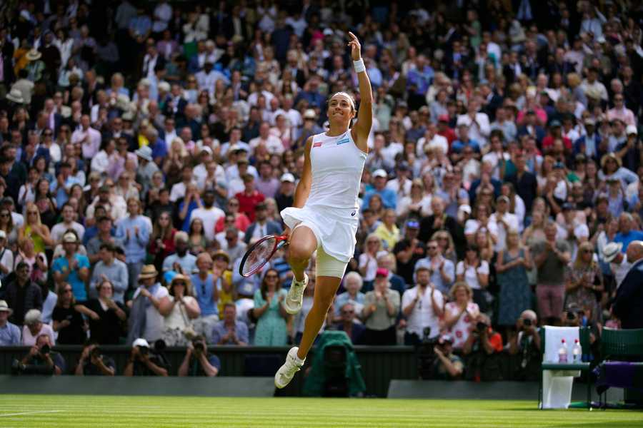 Wimbledon Tennis Week One Photo Gallery France's Caroline Garcia celebrates defeating Britain's Emma Raducanu in a singles tennis match on day three of the Wimbledon tennis championships in London, Wednesday, June 29, 2022.