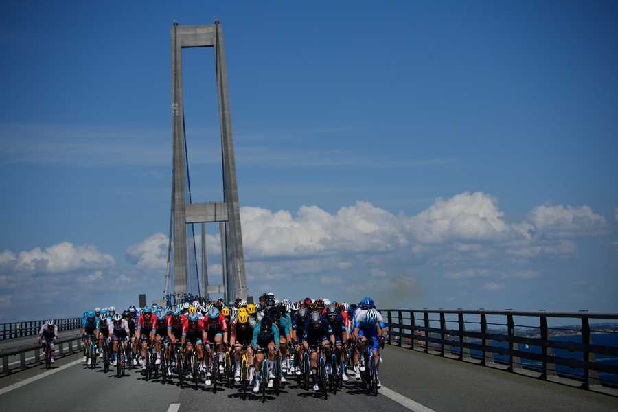 The pack rides over the Great Belt Bridge during the second stage of the Tour de France cycling race over 202.5 kilometers (125.8 miles) with start in Roskilde and finish in Nyborg, Denmark, Saturday, July 2, 2022.