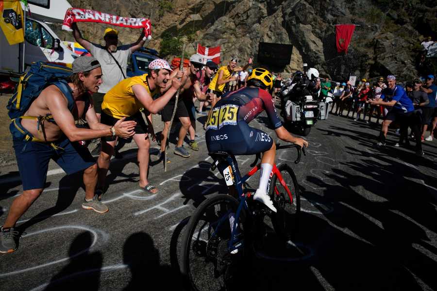 Britain's Thomas Pidcock climbs Alpe D'Huez during the twelfth stage of the Tour de France cycling race over 165.5 kilometers (102.8 miles) with start in Briancon and finish in Alpe d'Huez, France, Thursday, July 14, 2022.