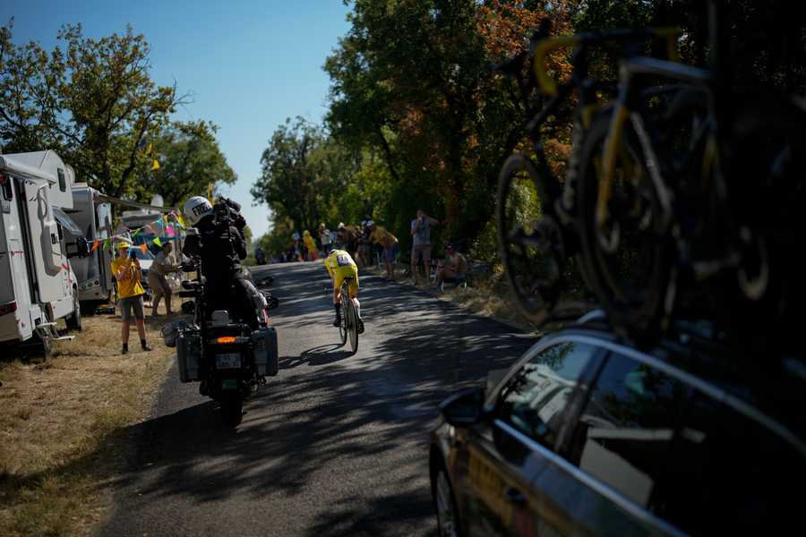 Denmark's Jonas Vingegaard, wearing the overall leader's yellow jersey, rides during the twentieth stage of the Tour de France cycling race, an individual time trial over 40.7 kilometers (25.3 miles) with start in Lacapelle-Marival and finish in Rocamadour, France, Saturday, July 23, 2022.