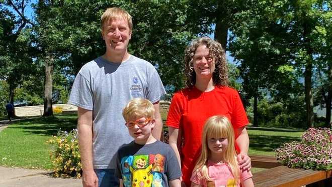 FILE&#x20;-&#x20;In&#x20;this&#x20;undated&#x20;file&#x20;photo&#x20;provided&#x20;by&#x20;the&#x20;Schmidt&#x20;and&#x20;Morehead&#x20;families,&#x20;Tyler&#x20;Schmidt&#x20;and&#x20;his&#x20;wife&#x20;Sarah&#x20;pose&#x20;with&#x20;their&#x20;son&#x20;Arlo,&#x20;bottom&#x20;left,&#x20;and&#x20;daughter&#x20;Lula&#x20;during&#x20;a&#x20;family&#x20;outing.&#x20;Autopsy&#x20;results&#x20;published&#x20;Thursday,&#x20;Aug.&#x20;4,&#x20;2022,&#x20;&#x20;say&#x20;three&#x20;family&#x20;members&#x20;killed&#x20;during&#x20;a&#x20;shooting&#x20;last&#x20;month&#x20;at&#x20;an&#x20;eastern&#x20;Iowa&#x20;state&#x20;park&#x20;were&#x20;shot,&#x20;stabbed&#x20;and&#x2F;or&#x20;strangled.&#x20;The&#x20;couple&amp;apos&#x3B;s&#x20;9-year-old&#x20;son&#x20;survived.&#x20;&#x28;Courtesy&#x20;of&#x20;the&#x20;Schmidt&#x20;and&#x20;Morehead&#x20;families&#x29;