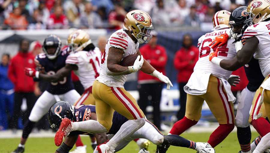 San Francisco 49ers running back Elijah Mitchell runs with the ball against the Chicago Bears during the first half of an NFL football game Sunday, Sept. 11, 2022, in Chicago. (AP Photo/Nam Y. Huh)
