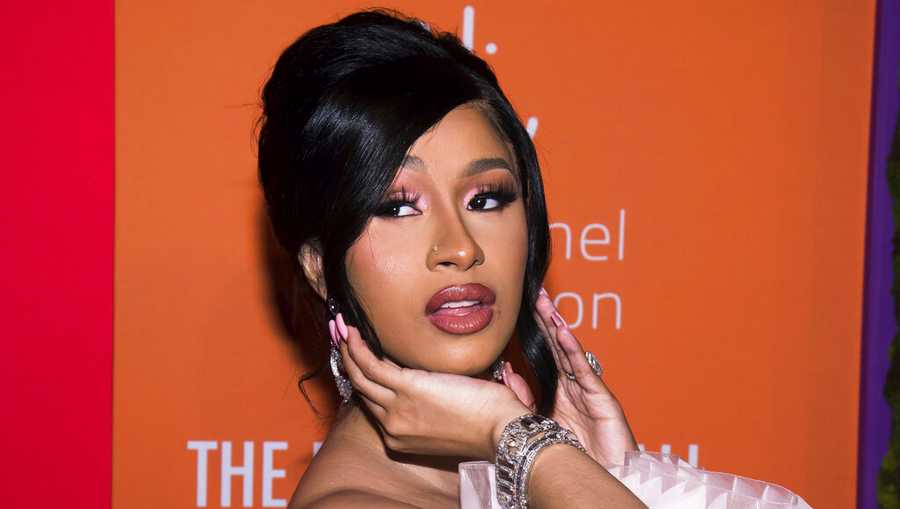 FILE - Cardi B appears at the 5th annual Diamond Ball benefit gala at Cipriani Wall Street in New York on Sept. 12, 2019. The Grammy-winning rapper resolved a yearslong criminal case stemming from a pair of brawls at New York City strip clubs by pleading guilty Thursday in a deal that requires her to perform 15 days of community service.  (Photo by Mark Von Holden/Invision/AP, File)