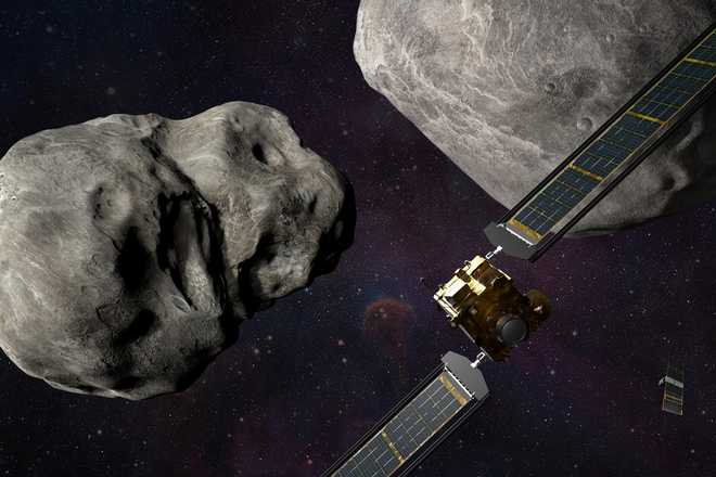 This&#x20;illustration&#x20;made&#x20;available&#x20;by&#x20;Johns&#x20;Hopkins&#x20;APL&#x20;and&#x20;NASA&#x20;depicts&#x20;NASA&#x27;s&#x20;DART&#x20;probe,&#x20;foreground&#x20;right,&#x20;and&#x20;Italian&#x20;Space&#x20;Agency&#x27;s&#x20;&#x28;ASI&#x29;&#x20;LICIACube,&#x20;bottom&#x20;right,&#x20;at&#x20;the&#x20;Didymos&#x20;system&#x20;before&#x20;impact&#x20;with&#x20;the&#x20;asteroid&#x20;Dimorphos,&#x20;left.&#x20;DART&#x20;is&#x20;expected&#x20;to&#x20;zero&#x20;in&#x20;on&#x20;the&#x20;asteroid&#x20;Monday,&#x20;Sept.&#x20;26,&#x20;2022,&#x20;intent&#x20;on&#x20;slamming&#x20;it&#x20;head-on&#x20;at&#x20;14,000&#x20;mph.&#x20;The&#x20;impact&#x20;should&#x20;be&#x20;just&#x20;enough&#x20;to&#x20;nudge&#x20;the&#x20;asteroid&#x20;into&#x20;a&#x20;slightly&#x20;tighter&#x20;orbit&#x20;around&#x20;its&#x20;companion&#x20;space&#x20;rock.