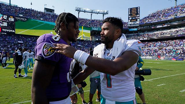 miami dolphins quarterback tua tagovailoa and baltimore ravens quarterback lamar jackson greet each other at the end of an nfl football game, sunday, sept. 18, 2022, in baltimore. the dolphins defeated the ravens 42-38.