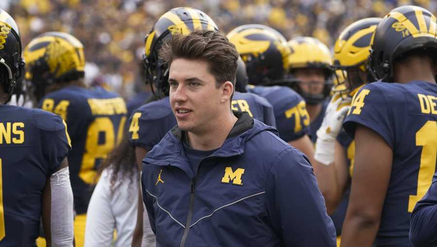 Michigan quarterback Cade McNamara watches in the second half of an NCAA college football game against Maryland in Ann Arbor, Mich., Saturday, Sept. 24, 2022. (AP Photo/Paul Sancya)