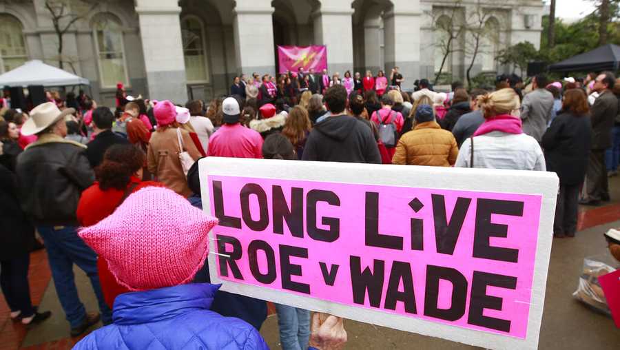 FILE - Supporters attend a rally held by Planned Parenthood commemorating the 45th anniversary of the landmark Roe vs. Wade Supreme Court ruling at the Capitol in Sacramento, Calif., Jan. 22, 2018. On Tuesday, Nov. 8, 2022, California voters will be asked to add the right to an abortion to the California Constitution. (AP Photo/Rich Pedroncelli, File)