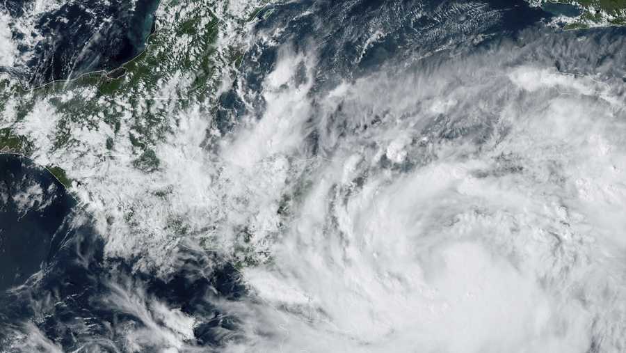 This Saturday, Oct. 8, 2022 satellite image made available by the U.S. National Oceanic and Atmospheric Administration shows Tropical Storm Julia at 4 p.m. EDT.