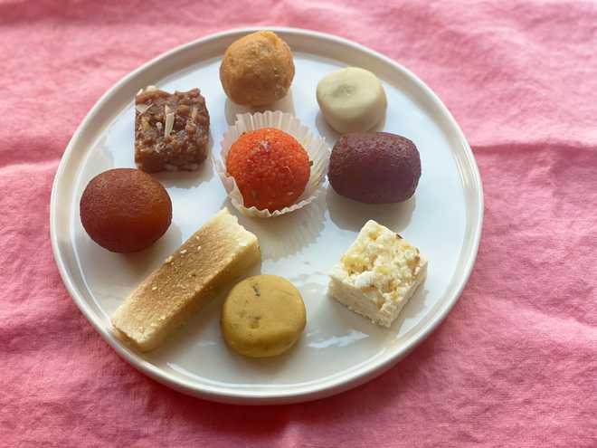 An assortment of candies from an Indian food store is displayed in New York on October 19, 2022. These candies are usually enjoyed during Diwali, the Hindu festival of lights.