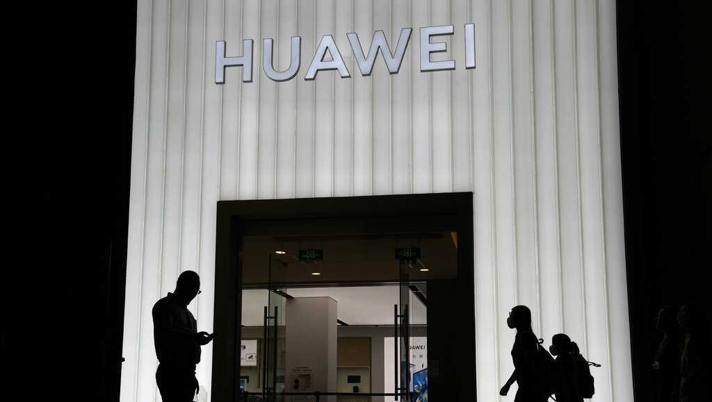 Two Chinese officers are accused of conspiring to obstruct the Huawei investigation