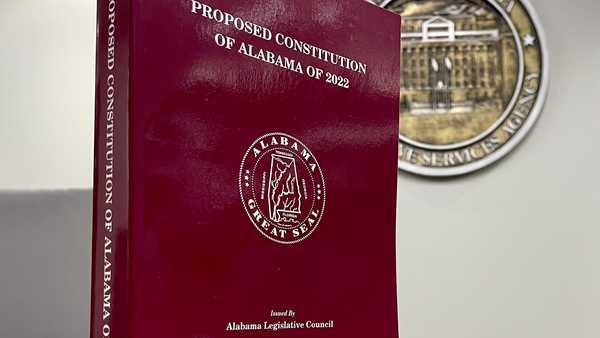 A copy of the proposed constitution of Alabama of 2022 is seen at the statehouse in Montgomery, Ala., on Tuesday, Nov. 1, 2022. Alabama voters on Nov. 8 will vote whether to ratify a recompiled Alabama Constitution that strips racist language and deleted repealed and redundant sections. The state's governing document will remain the longest in the United States at over 300,000 words. (AP Photo/Kim Chandler)