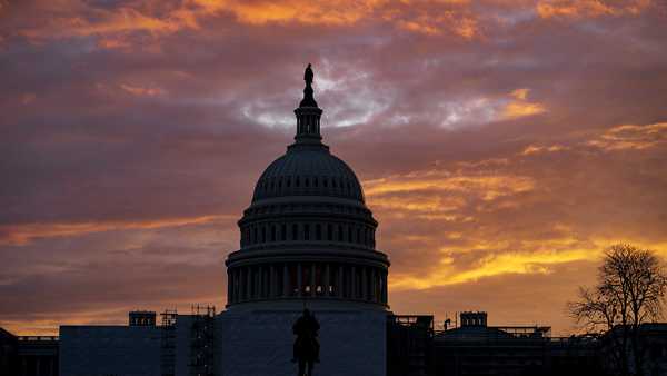 Hues of red and blue color the dawn at the Capitol in Washington, Monday, Nov. 7, 2022. Control of Congress and of President Joe Biden's agenda on Capitol Hill are at stake this Election Day. Energized Republicans are working to claw back power in the House and Senate and end the Democratic Party's hold on Washington. (AP Photo/J. Scott Applewhite)