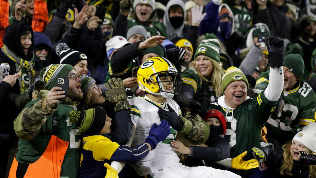 Rookie Christian Watson Lambeau Leap! 