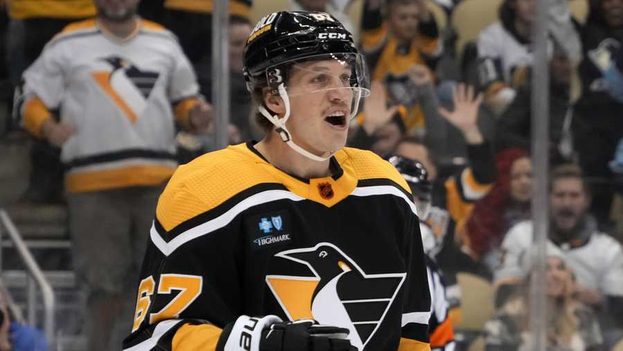 Pittsburgh Penguins&apos; Rickard Rakell celebrates his goal against the Vegas Golden Knights during the second period of an NHL hockey game in Pittsburgh, Thursday, Dec. 1, 2022. (AP Photo/Gene J. Puskar)