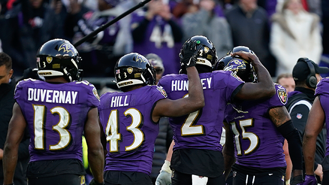 baltimore ravens players celebrate a touchdown by baltimore ravens quarterback tyler huntley (2) in the final minute of an nfl football game against the denver broncos, sunday, dec. 4, 2022, in baltimore.