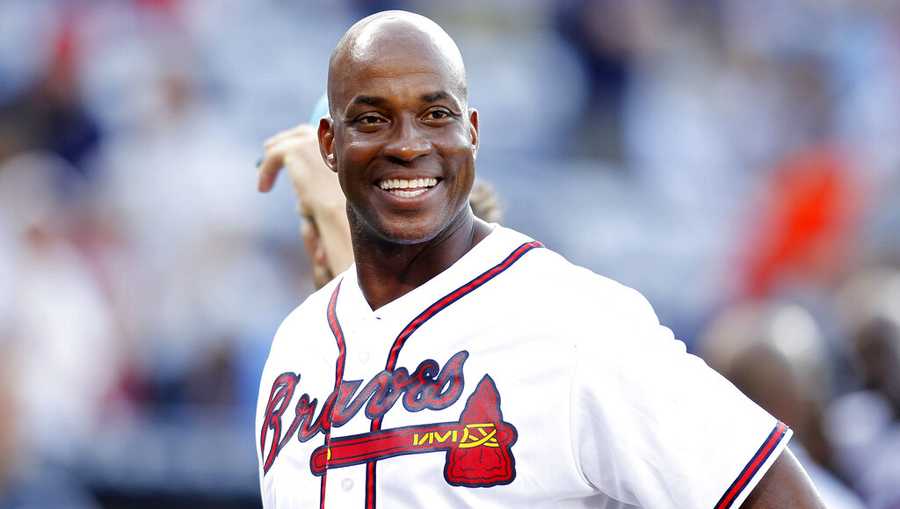 FILE - Former Atlanta Braves first baseman Fred McGriff smiles on the field before a baseball game against the Miami Marlins, Friday, Aug. 7, 2015, in Atlanta.  Barry Bonds, Roger Clemens and Curt Schilling were passed over by a Baseball Hall of Fame committee that elected former big league slugger Fred McGriff to Cooperstown on Sunday, Dec. 4, 2022. (AP Photo/Brett Davis, File)