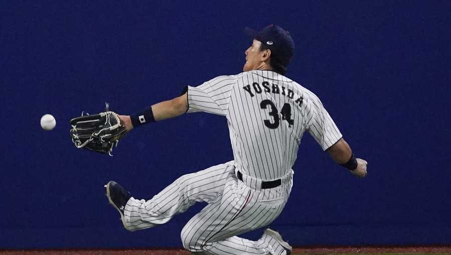 FILE - Japan's Masataka Yoshida during the seventh inning of a baseball game at the 2020 Summer Olympics, Aug. 2, 2021, in Yokohama, Japan. Yoshida will be able to negotiate with Major League Baseball teams starting Wednesday, Dec. 6, 2022, under the posting system with the Japanese big leagues. (AP Photo/Sue Ogrocki, File)
