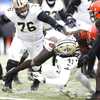 Saints overcome deficit, bitter cold to beat Browns 17-10