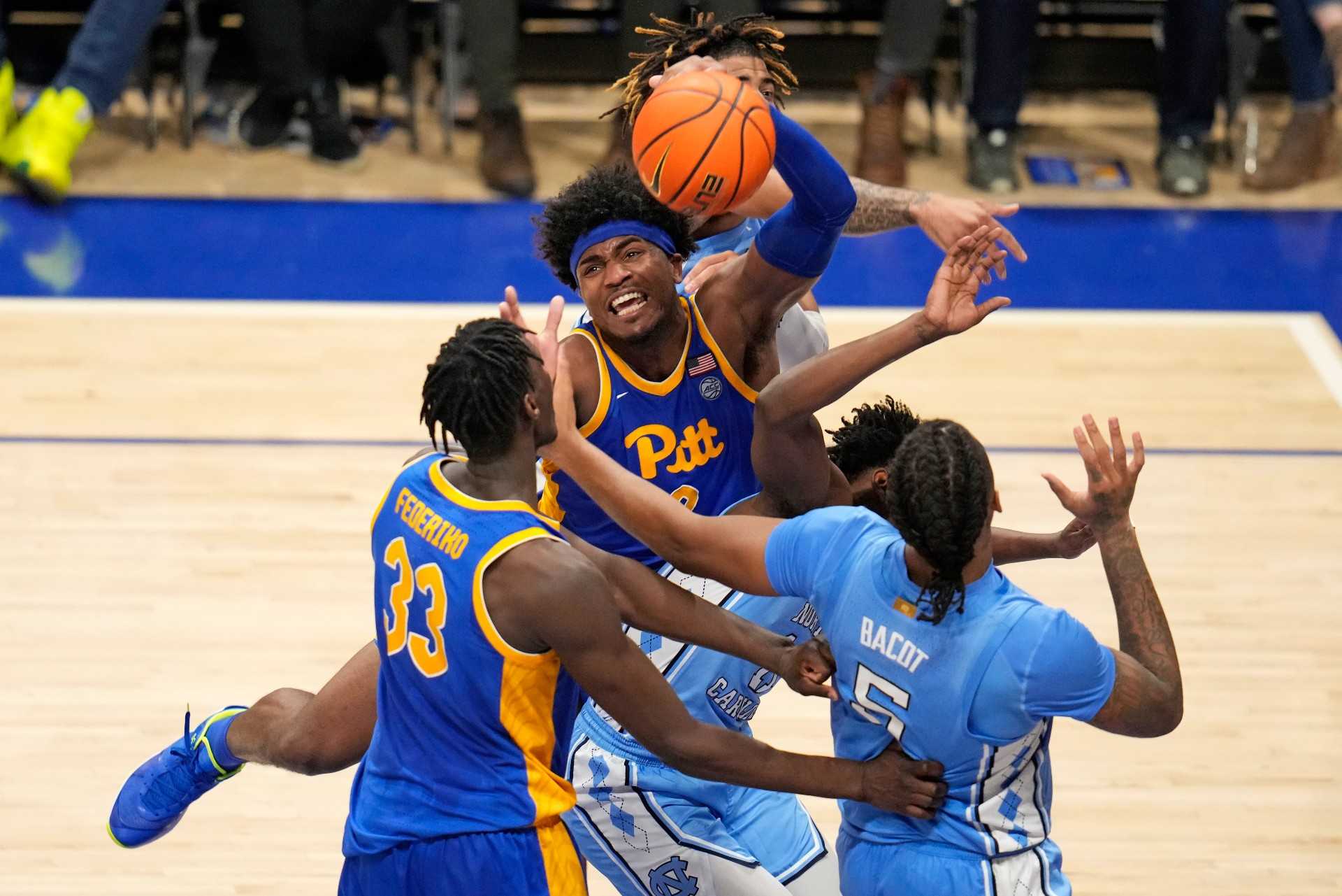 Burton scores 31 Pitt beats No. 25 North Carolina 74 72