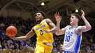 Pittsburgh's Nelly Cummings (0) attempts a shot ahead of Duke's Kyle Filipowski (30) during the first half of an NCAA college basketball game in Durham, N.C., Wednesday, Jan. 11, 2023. (AP Photo/Ben McKeown)