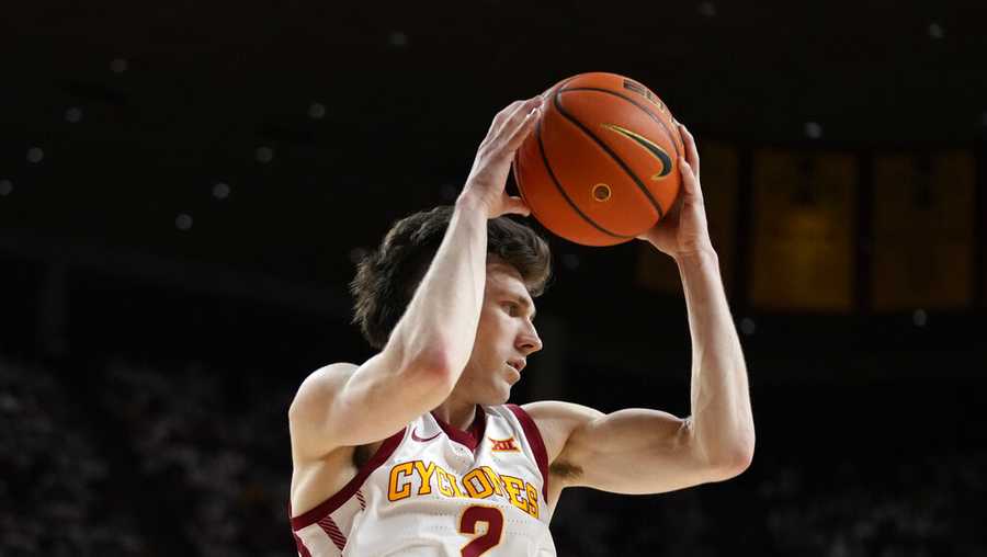 Iowa State guard Caleb Grill grabs a rebound during the first half of an NCAA college basketball game against Texas, Tuesday, Jan. 17, 2023, in Ames, Iowa. (AP Photo/Charlie Neibergall)