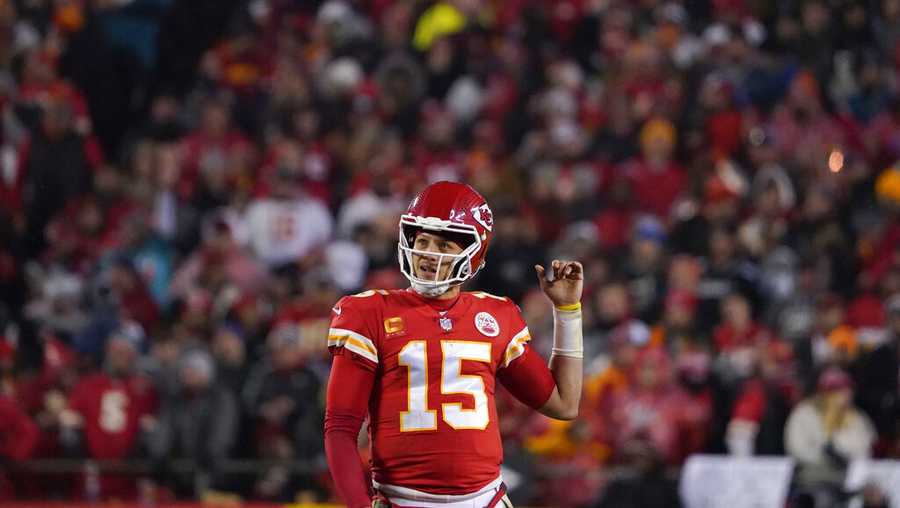 Kansas City Chiefs quarterback Patrick Mahomes (15) watches a replay during the second half of an NFL divisional round playoff football game against the Jacksonville Jaguars, Saturday, Jan. 21, 2023, in Kansas City, Mo. (AP Photo/Ed Zurga)