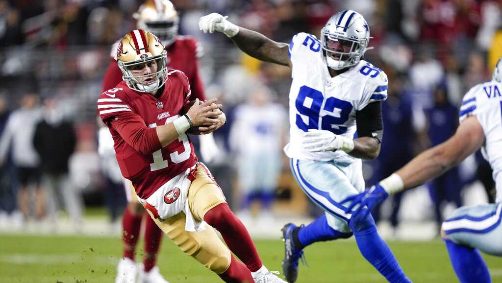 Dallas Cowboys defensive bak Donovan Wilson (6) jogs off the field