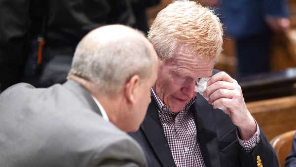 Attorney Jim Griffin speaks with Alex Murdaugh tears up after the jury was excused and the defense and prosecution teams discuss how to handle sensitive crime scene photos during his double murder trial at the Colleton County Courthouse in Walterboro, S.C, Wednesday, Jan. 25, 2023. (Joshua Boucher/The State via AP)