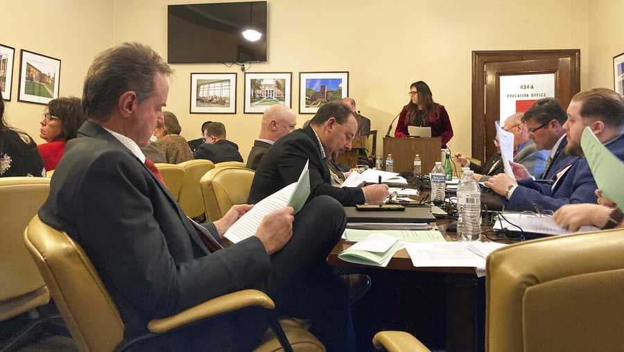 Members of the West Virginia House of Delegates' Education Committee discuss proposed legislation during a meeting at the state Capitol in Charleston, W.Va., on Wednesday, Jan. 25, 2023. One bill the committee advanced would allow staff in K-12 schools to carry firearms. (AP Photo/Leah Willingham)