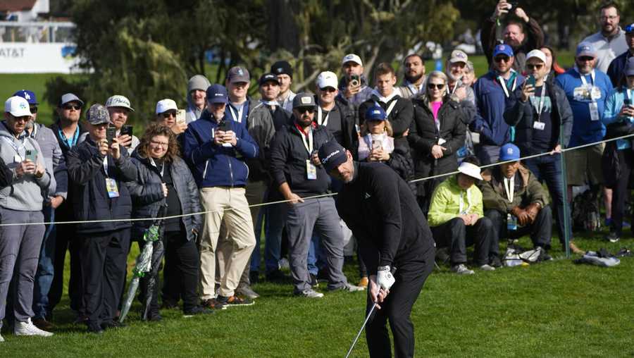 Aaron Rodgers follows his shot onto the 16th green of the Pebble Beach Golf Links during the third round of the AT&T Pebble Beach Pro-Am golf tournament in Pebble Beach, Calif., Sunday, Feb. 5, 2023. (AP Photo/Godofredo A. Vásquez)