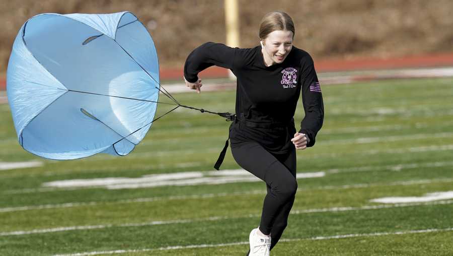 East Palestine High School senior Mia Lee trains for track, Monday, March 6, 2023, in East Palestine, Ohio. Athletes are navigating spring sports following the Feb. 3 Norfolk Southern freight train derailment. (AP Photo/Matt Freed)