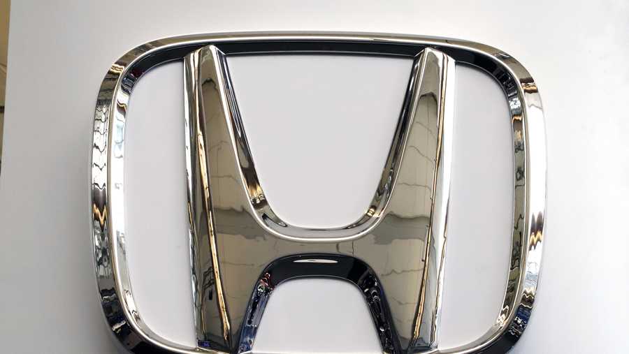 FILE- This Feb. 14, 2019 file photo shows a Honda logo at the 2019 Pittsburgh International Auto Show in Pittsburgh.