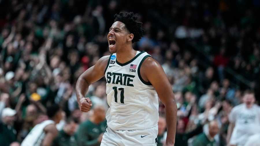 March Madness Michigan State guard A.J. Hoggard (11) celebrates in the second half of a first-round college basketball game against Southern California in the men's NCAA Tournament in Columbus, Ohio, Friday, March 17, 2023. Michigan State defeated Southern California 72-62. (AP Photo/Michael Conroy)