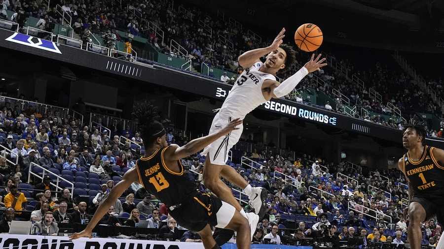 March Madness Xavier guard Colby Jones passes away from Kennesaw State guard Kasen Jennings during the first half of a first-round college basketball game in the NCAA Tournament on Friday, March 17, 2023, in Greensboro, N.C. (AP Photo/Chris Carlson)