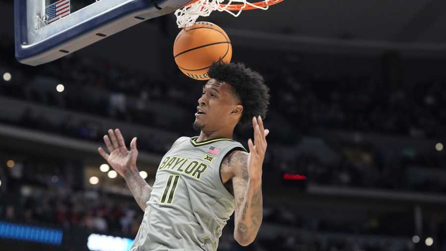 March Madness Baylor forward Jalen Bridges dunks in the first half of a first-round college basketball game against UC Santa Barbara in the men's NCAA Tournament Friday, March 17, 2023, in Denver. (AP Photo/David Zalubowski)