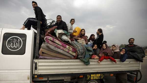 Palestinians flee the Israeli ground offensive in Khan Younis, Gaza Strip, Wednesday, Dec. 27, 2023. (AP Photo/Mohammed Dahman)