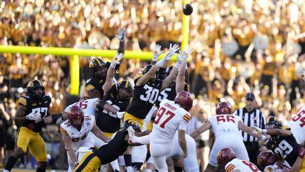 Iowa State place kicker Kyle Konrardy (97) kicks a 54-yard field goal during the second half of an NCAA college football game against Iowa, Saturday, Sept. 7, 2024, in Iowa City, Iowa. Iowa State won 20-19. (AP Photo/Charlie Neibergall)