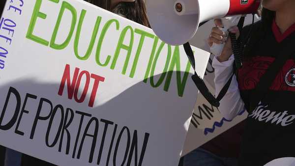FILE - Students march at Arizona State University in protest of ASU's chapter of College Republicans United-led event encouraging students to report "their criminal classmates to ICE for deportations", Jan. 31, 2025, in Tempe, Ariz. (AP Photo/Ross D. Franklin, File)