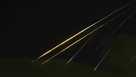 Traces of projectile illuminates the sky seen from northern Israel, Saturday, June 14, 2025. (AP Photo/Ariel Schalit)