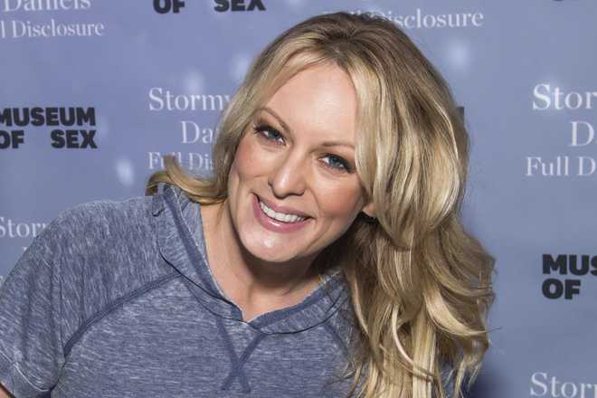 FILE&#x20;-&#x20;Adult&#x20;film&#x20;actress&#x20;Stormy&#x20;Daniels&#x20;attends&#x20;a&#x20;book&#x20;signing&#x20;for&#x20;her&#x20;memoir&#x20;&quot;Full&#x20;Disclosure&quot;&#x20;at&#x20;the&#x20;Museum&#x20;of&#x20;Sex&#x20;on&#x20;Oct.&#x20;8,&#x20;2018,&#x20;in&#x20;New&#x20;York.&#x20;&#x28;Photo&#x20;by&#x20;Charles&#x20;Sykes&#x2F;Invision&#x2F;AP&#x29;