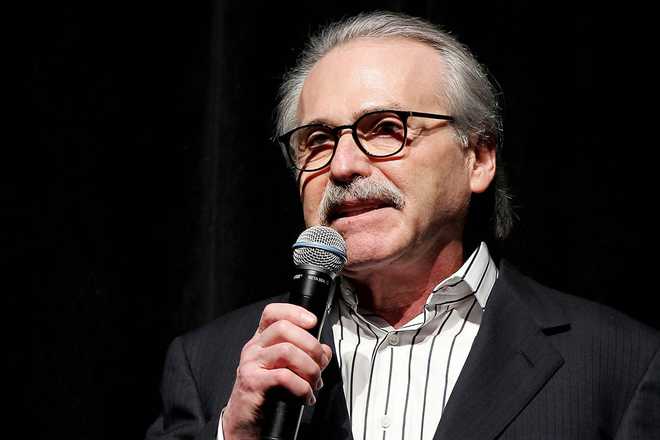 FILE&#x20;-&#x20;David&#x20;Pecker,&#x20;Chairman&#x20;and&#x20;CEO&#x20;of&#x20;American&#x20;Media,&#x20;addresses&#x20;those&#x20;attending&#x20;the&#x20;Shape&#x20;&amp;&#x20;Men&amp;apos&#x3B;s&#x20;Fitness&#x20;Super&#x20;Bowl&#x20;Party&#x20;in&#x20;New&#x20;York,&#x20;on&#x20;Jan.&#x20;31,&#x20;2014.&#x20;&#x28;Marion&#x20;Curtis&#x20;via&#x20;AP,&#x20;File&#x29;