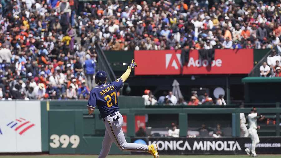 Willy Adames of the Milwaukee Brewers hits a three run homerun in