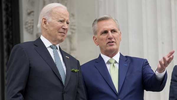 FILE - President Joe Biden talks with House Speaker Kevin McCarthy of Calif., on the House steps as they leave after attending an annual St. Patrick's Day luncheon gathering at the Capitol in Washington, Friday, March 17, 2023. Facing the risk of a government default as soon as June 1, President Joe Biden has invited the top four congressional leaders to a White House meeting for talks on Tuesday, May 9. (AP Photo/Alex Brandon, File)