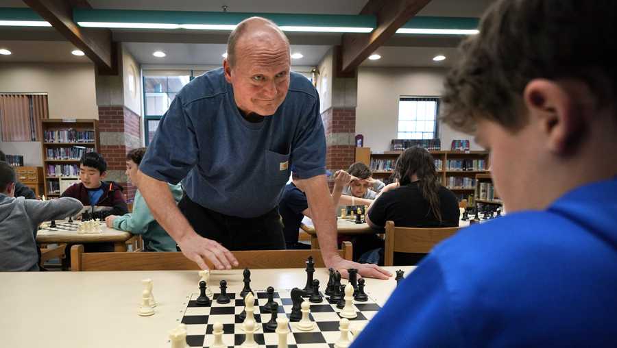 Hampden custodian leads school chess teams
