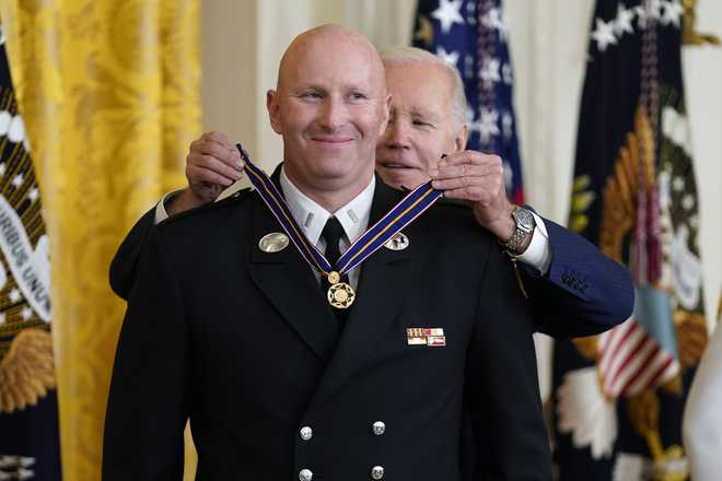 Missing hand only change in Medal of Honor recipient - friends say, Article