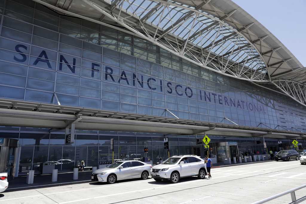 ICE agents restrain woman in front of her child at SFO, sparking outrage