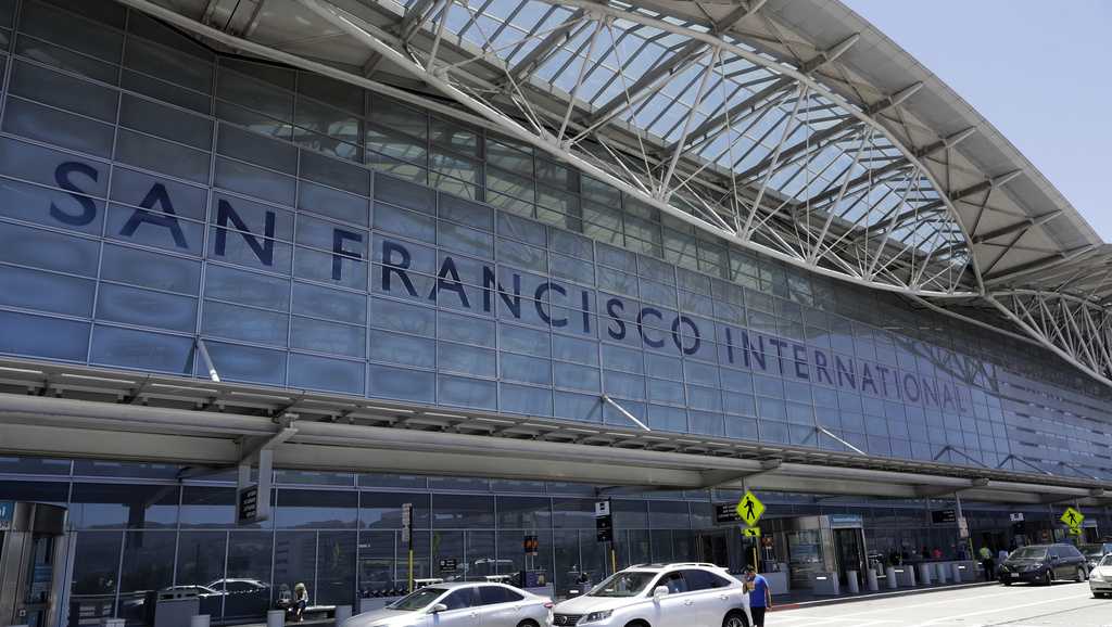 ICE agents restrain woman in front of her child at SFO, sparking outrage
