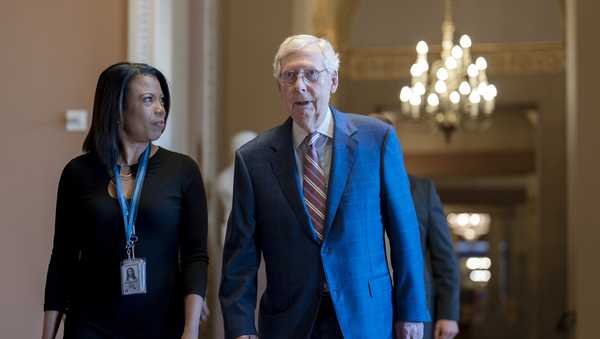 Days away from a default crisis, Senate Minority Leader Mitch McConnell, R-Ky., walks to the chamber as the Senate dashes to wrap up work on the big debt ceiling and budget cuts package, at the Capitol in Washington, Thursday, June 1, 2023. (AP Photo/J. Scott Applewhite)