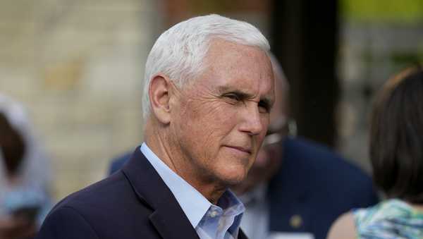 Former Vice President Mike Pence talks with local residents during a meet and greet on May 23, 2023, in Des Moines, Iowa. Pence will officially launch his widely expected campaign for the Republican nomination for president in Iowa on June 7. (AP Photo/Charlie Neibergall)