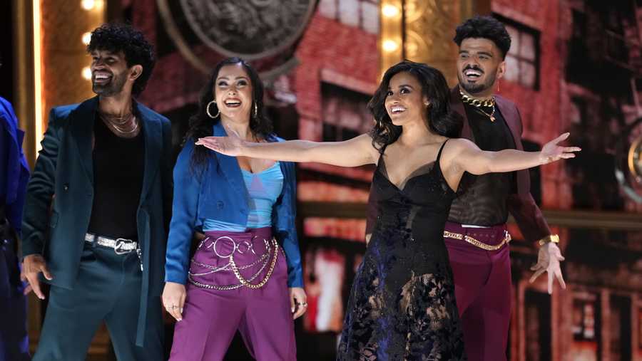 Host Ariana DeBose, third right, performs at the 76th annual Tony Awards on Sunday, June 11, 2023, at the United Palace theater in New York. (Photo by Charles Sykes/Invision/AP)